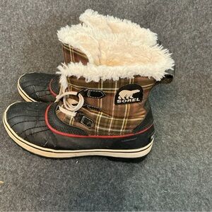 Sorel Black and Tan Plaid Boots with Cream Fur